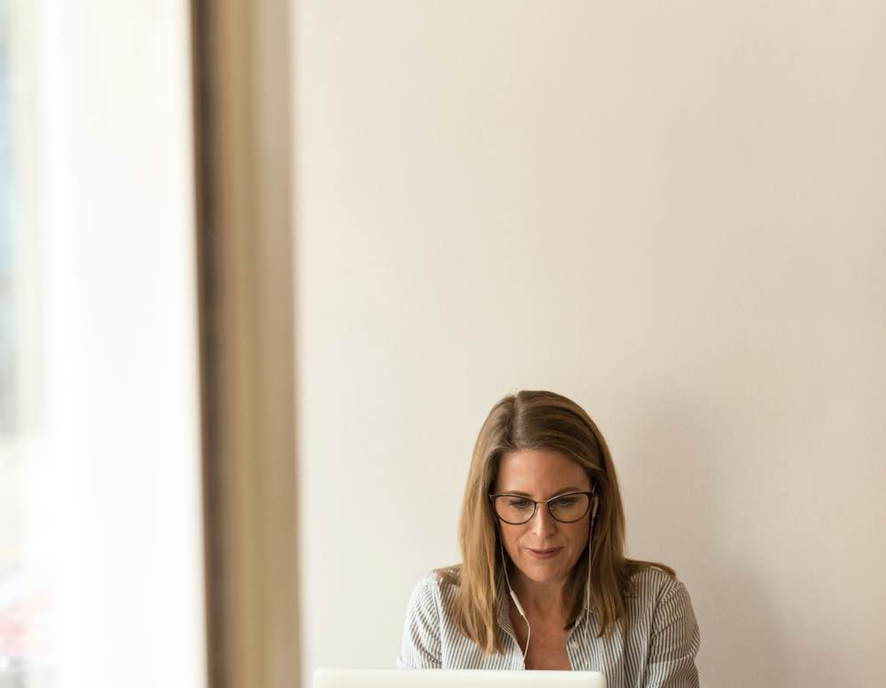 A women working on a laptop