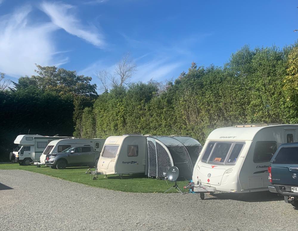 A number of caravans and campervans in Abisko power sites in Methven